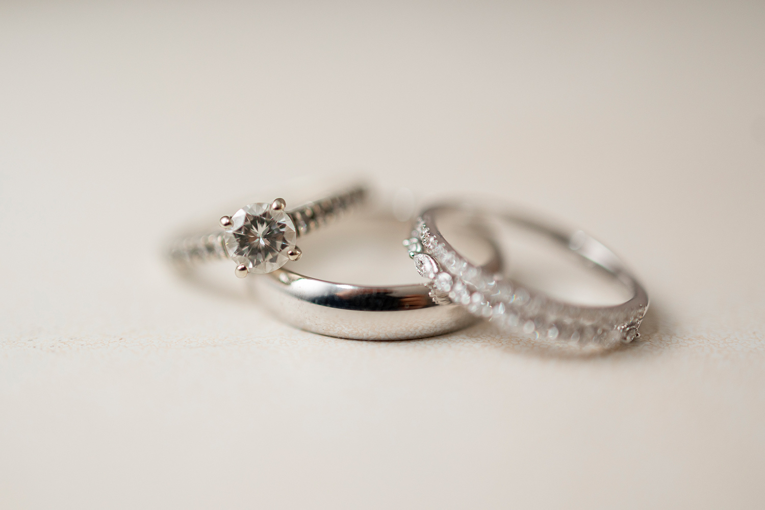 wedding rings on a white table